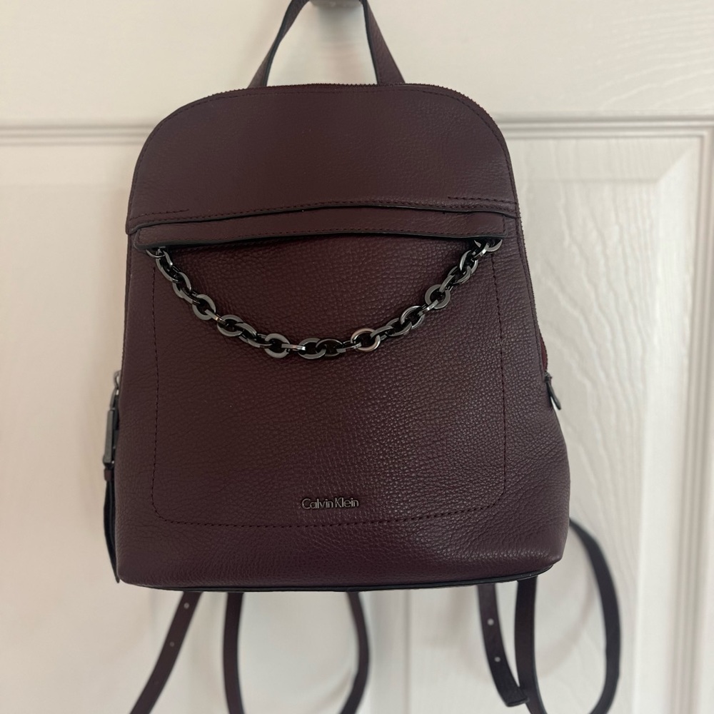 Calvin Klein bag pack, burgundy and very nice condition